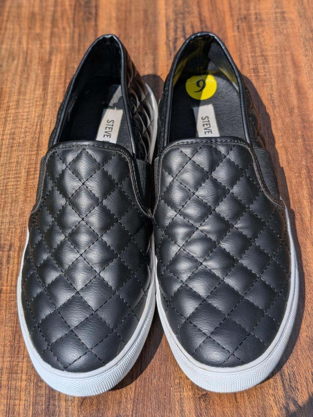 Steve Madden Black Quilted Slip-On Sneakers with White Sole